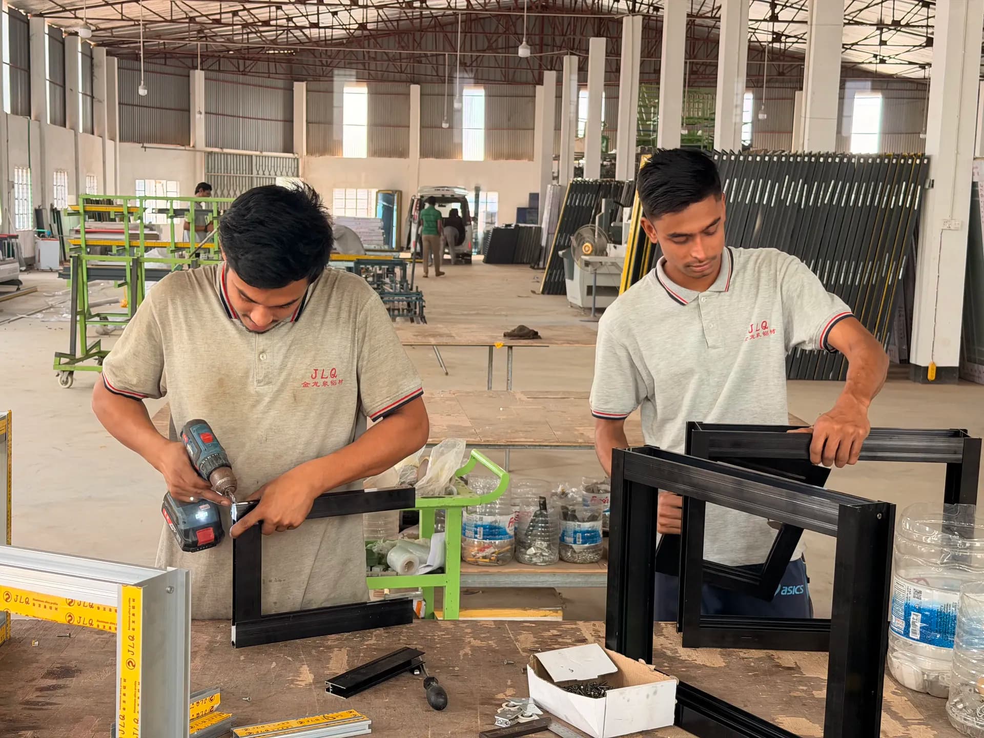 JLQ Aluminium manufacturing — black frame drilling